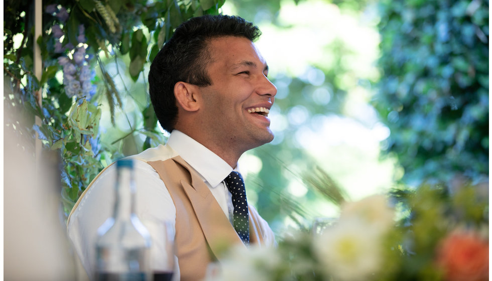 Groom Jamie in his marquee at his summer wedding.