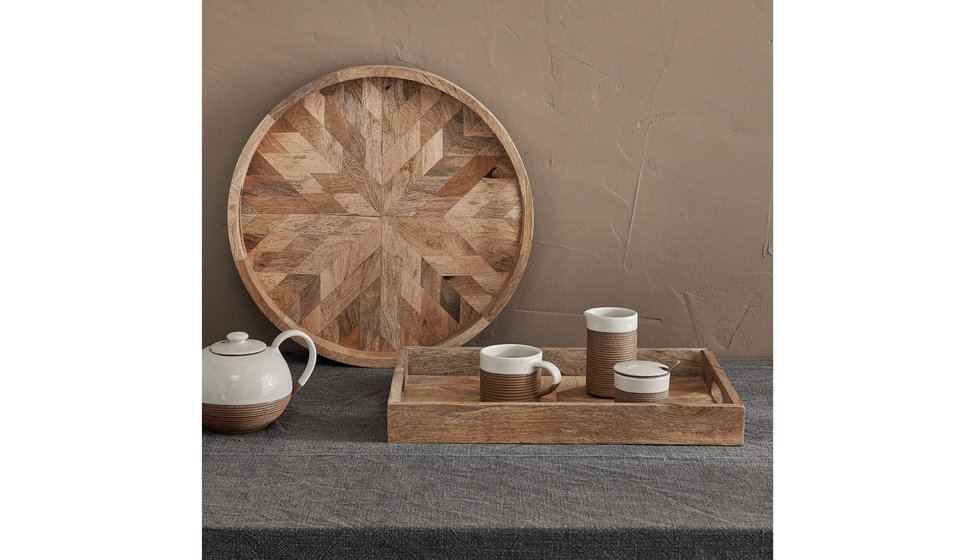 A Nkuku Tray with a teapot and mugs.