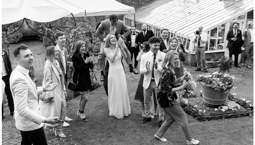 Sarah and Nico's guests all waiting to catch the bouquet.