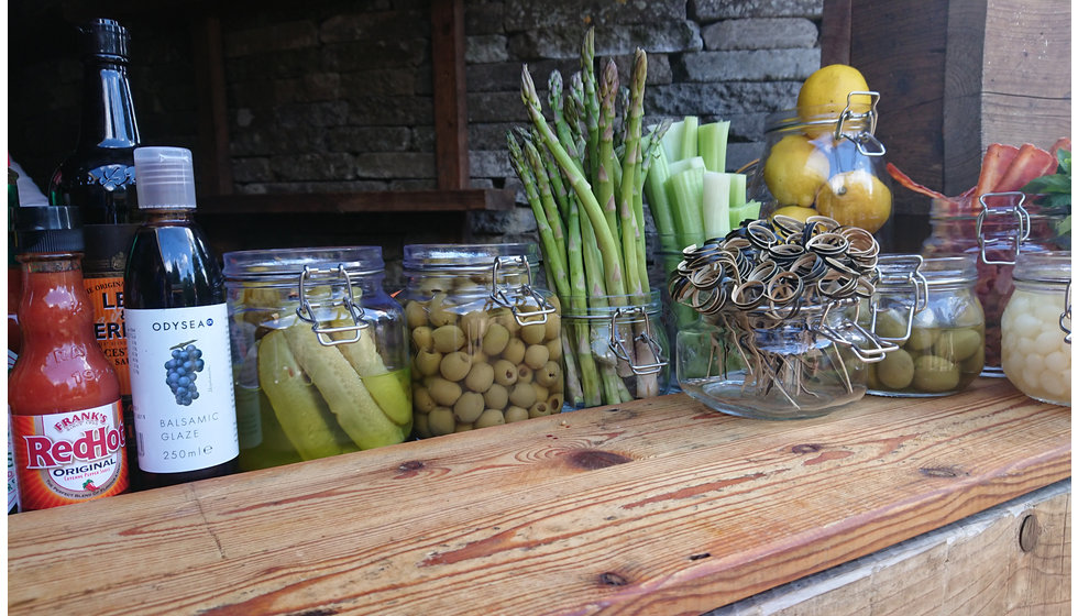 A Bloody Mary Station laid out with all of the ingredients for guests to make their own Bloody Mary.