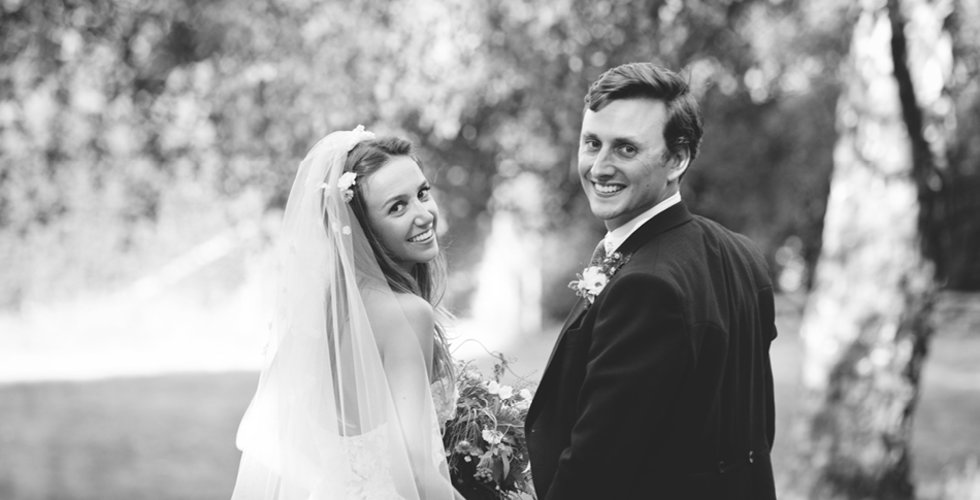 Daisy and Charlie beaming on their wedding day. 