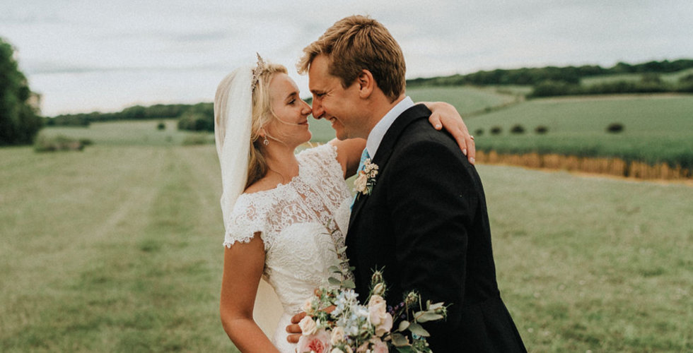 Harriet and Ed in a field on your wedding day.